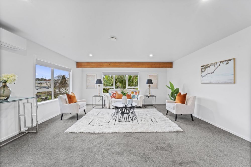 Reclad project: refreshed living room with exposed timber beam