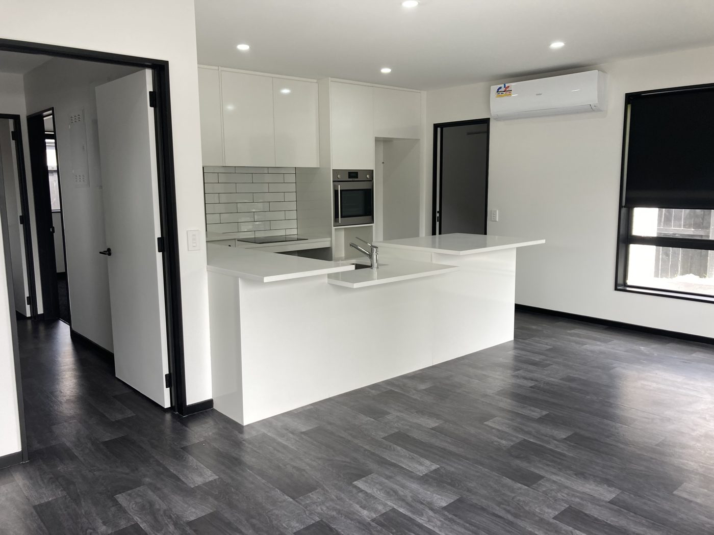 Completed townhouse kitchen and living area