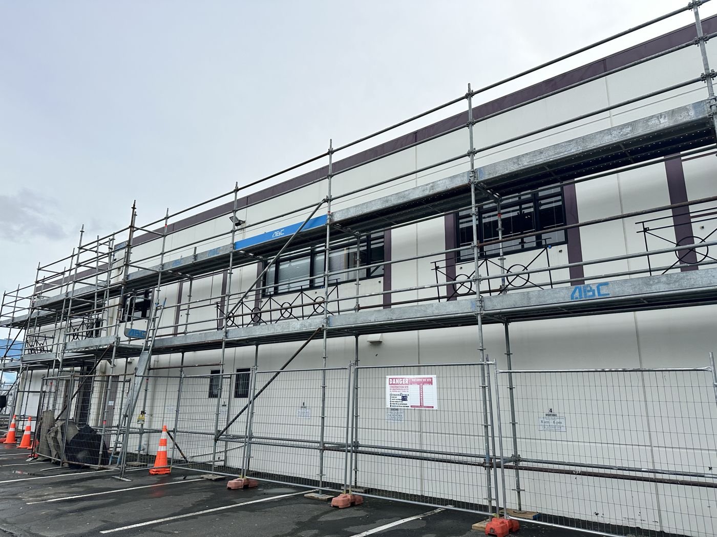 Scaffolding and site fencing around the building during repairs