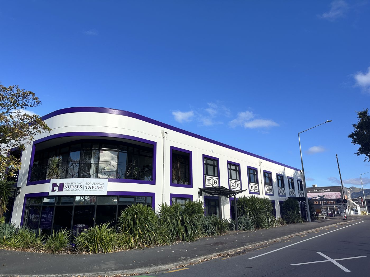 Completed commercial building after cladding repairs and repaint